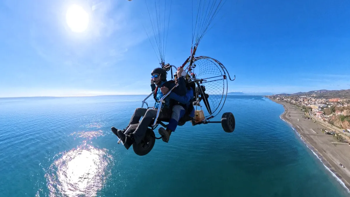 Student in flight during their first paramotor lesson